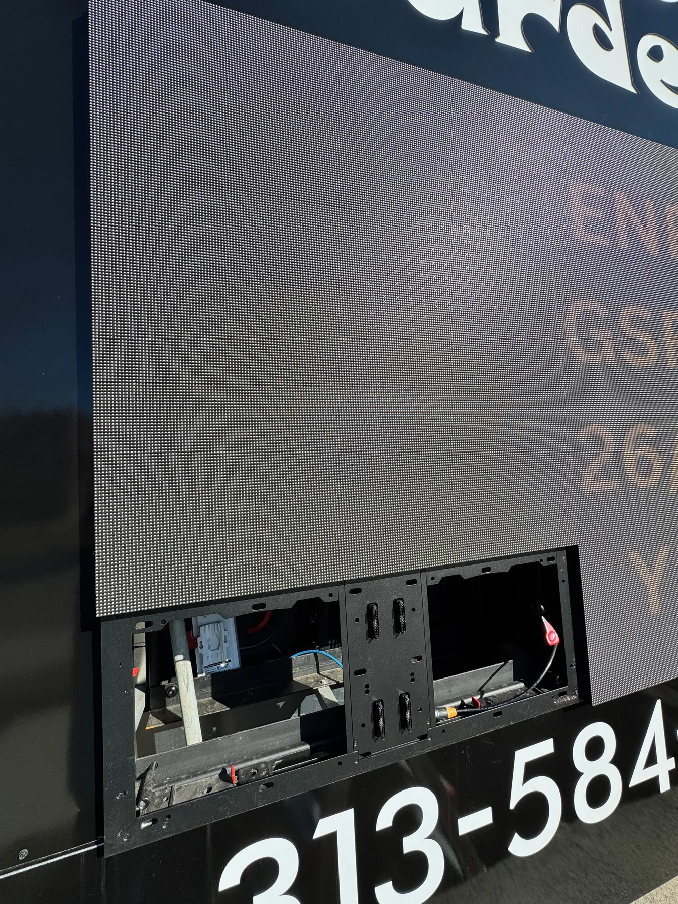 Service access detail on Children's Garden outdoor LED display