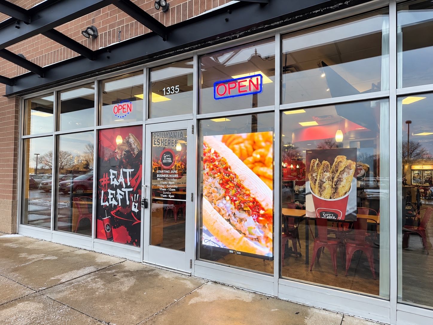Lefty's Detroit storefront with a transparent LED poster displaying food content