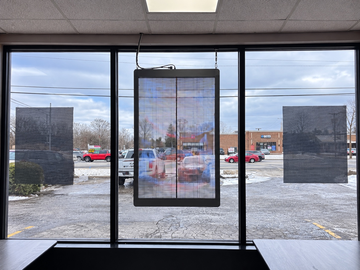 Interior view through the transparent LED poster at Lefty's Livonia
