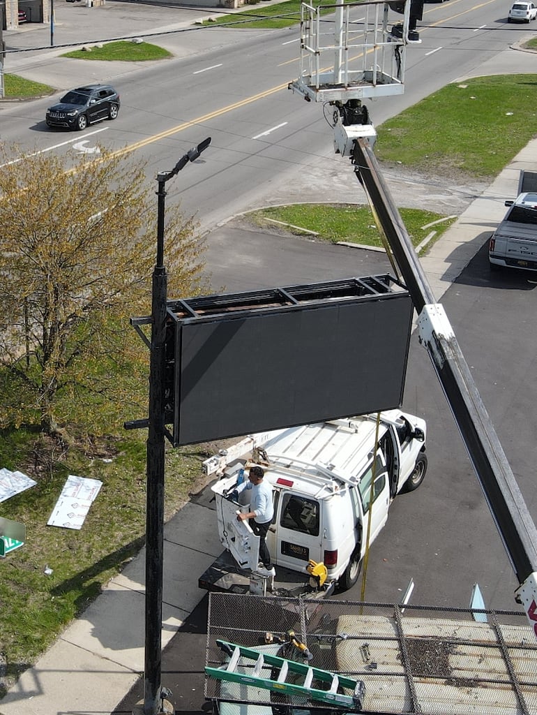 Zazen Pole Sign Crane Lift Installation