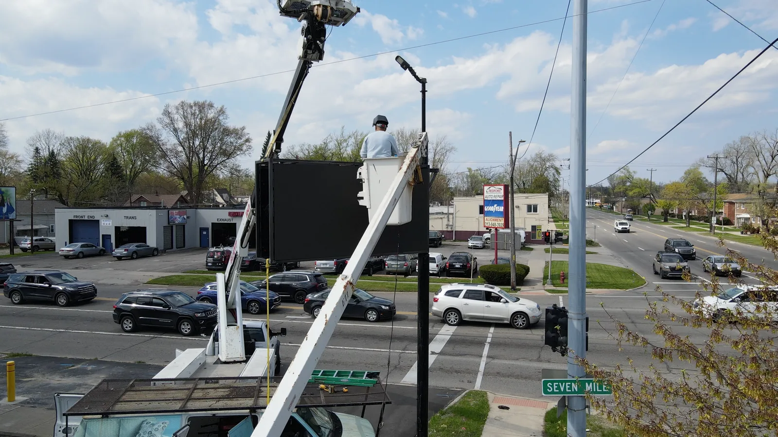 Outdoor LED display being mounted on Zazen pole sign in Redford Township