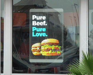 Transparent LED poster on a floor stand