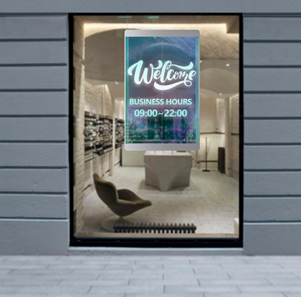 Commercial transparent storefront LED screen in retail vitrine with Welcome Business Hours