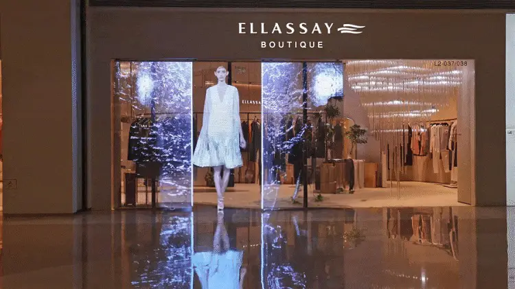 Transparent LED display in a boutique storefront window